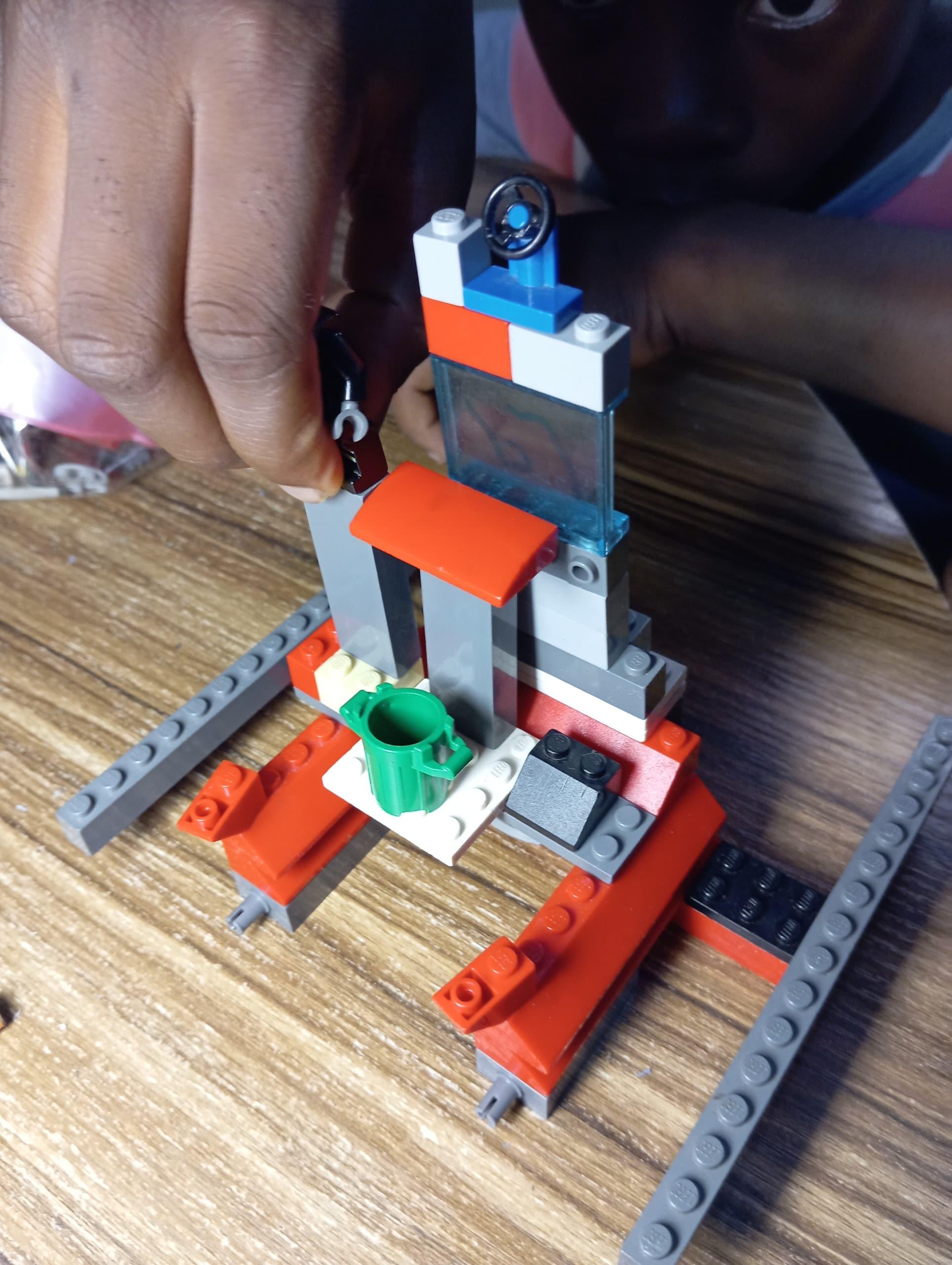 A young learner absorbed in a building activity